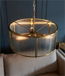 Classically Styled Fluted Drum Pendant Light in Antique Brass Finish